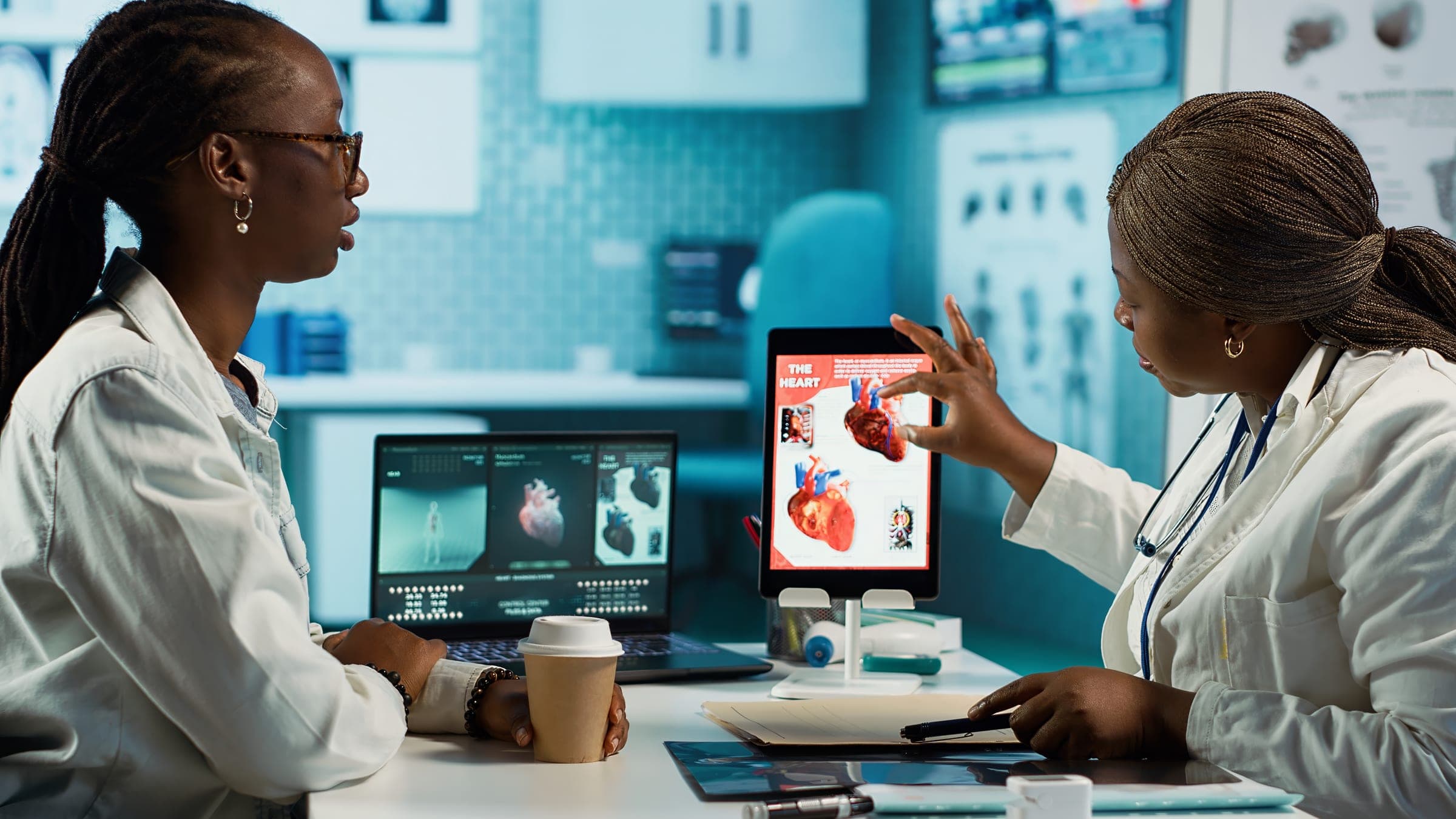 Doctor and patient reviewing test results together.